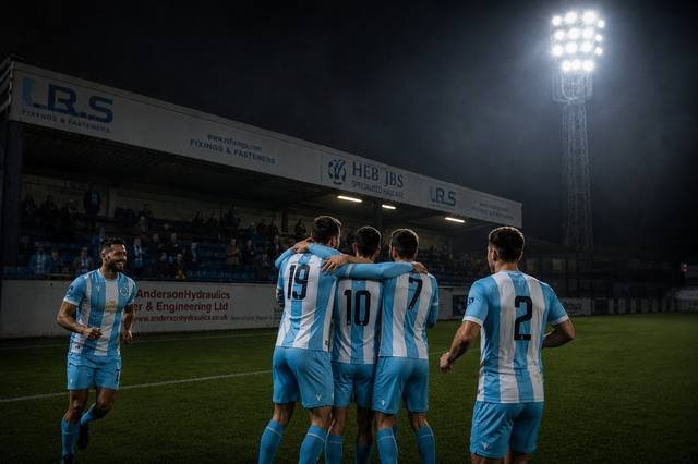 Joueurs de football sous les projecteurs